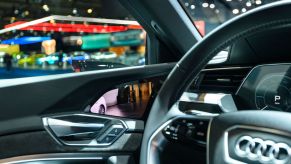 Camera rear view mirror on an Audi e-tron 55 Quattro full electric luxury crossover SUV car on display at Brussels Expo