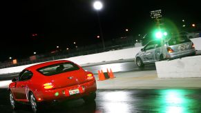 Bentley vs Honda at the drag strip