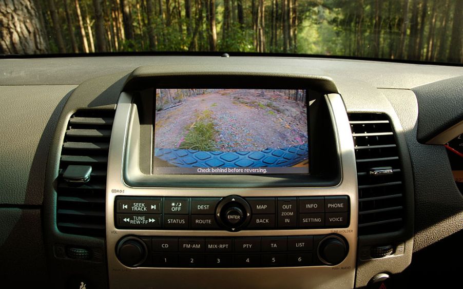 A backup camera displayed on the screen of a car