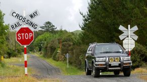 A driver pulling up to a traffic sign