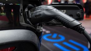 A charging plug for an electric vehicle is seen in the Mercedes-Benz booth at the Tokyo Auto Salon 2020