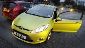 A lime green Ford Fiesta