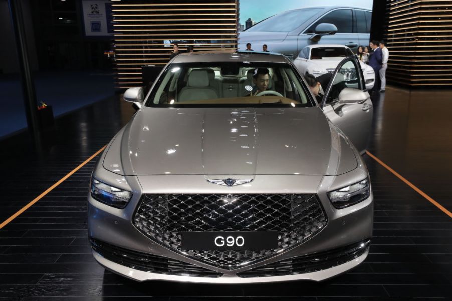 A Genesis G90 on display at an auto show