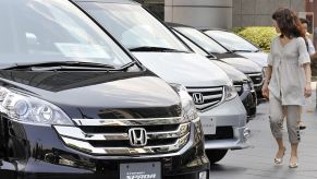 A women shopping for a car at a Honda dealership