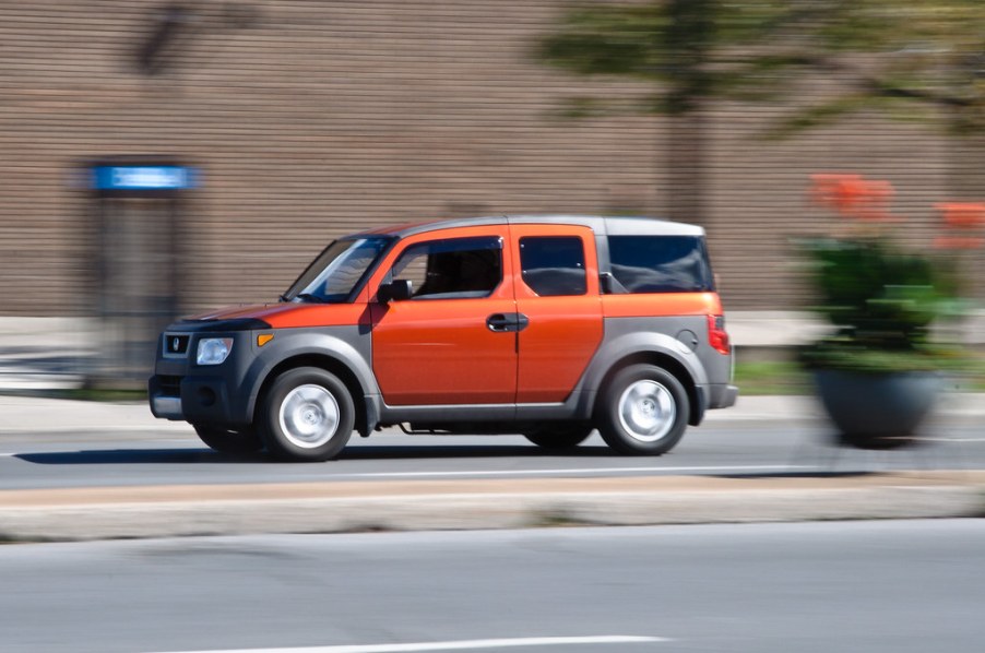 The Honda Element driving on the road