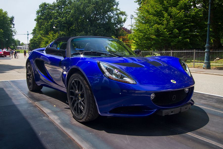 A bright blue Lotus Elise parked at the Parco Valentino car show