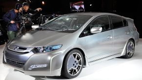 A Honda Insight on display at an auto show