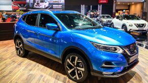 A Nissan Rogue on display at an auto show