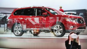 A new Nissan Pathfinder on display at an auto show