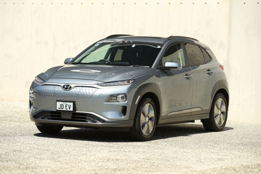 A Hyundai Kona parked outside a building