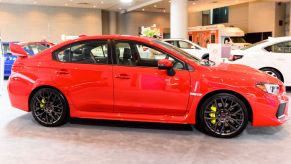 A new Subaru WRX STI on display at an auto show