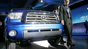 A man presenting a new Toyota Tundra at an auto show