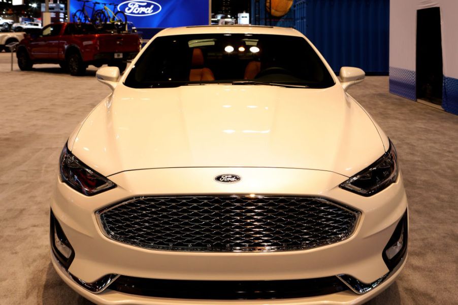 A white Ford Fusion on display