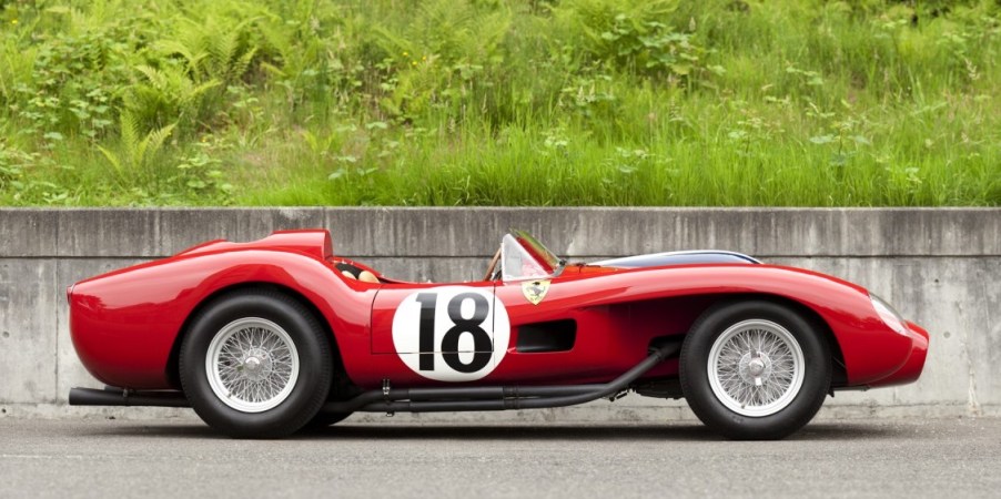 a 1957 Ferrari 250 Testa Rossa with a scenic background