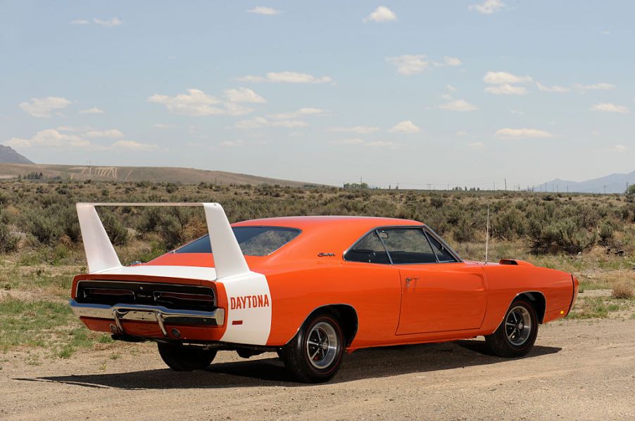 A Dodge Charger Daytona parked on a dusty road