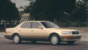 A beige 1990 Lexus LS400 in a parking lot