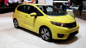 A 2015 Honda Fit on display at an auto show