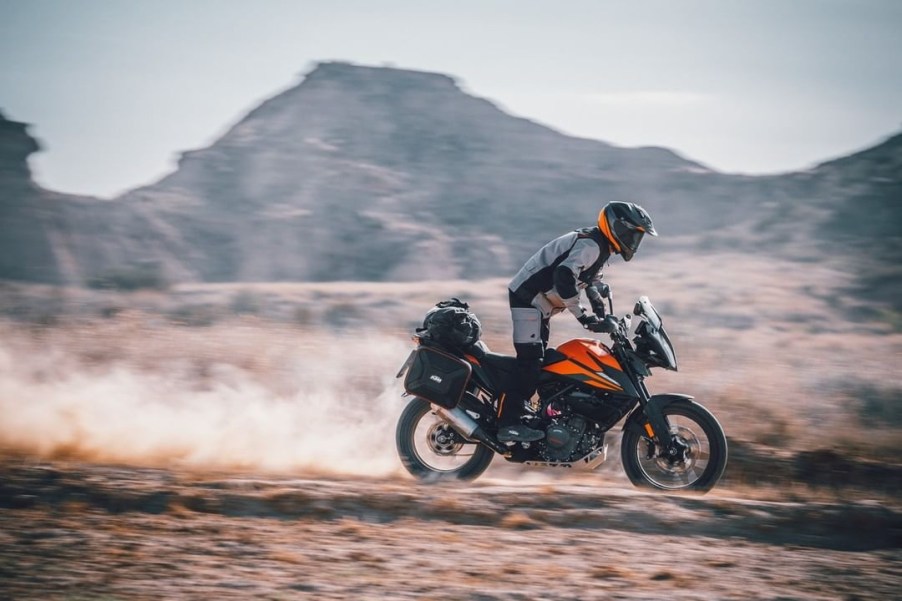 2020 KTM 390 Adventure motorcycle riding through the desert