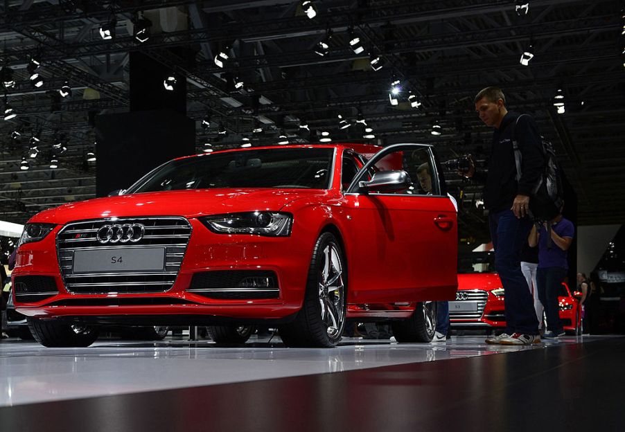 Audi S4 model inspected by visitors during the Moscow International Motor Show 'Autosalon 2014' the leading automotive event of the year in Moscow