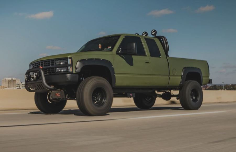 Green and lifted 1993 Chevy Pickup