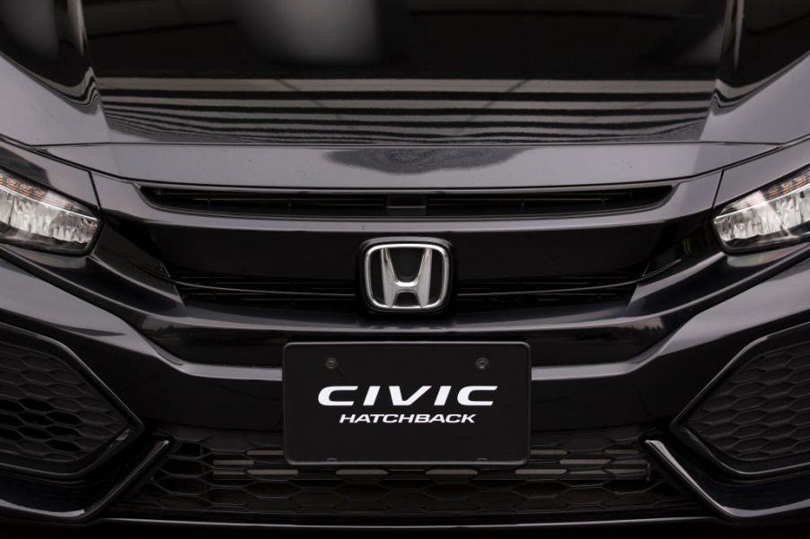 A Honda Motor Co. Civic Hatchback vehicle is displayed outside the company's headquarters