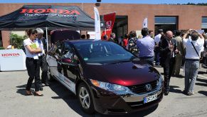 People checking out the Hydrogen powered Honda Clarity