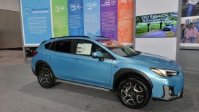 A Subaru Crosstrek on display at an auto show