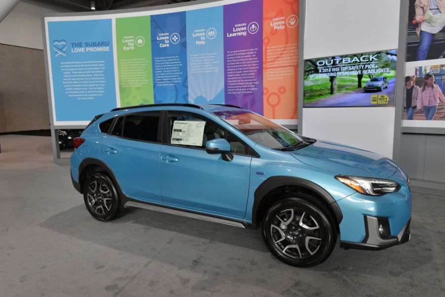 A Subaru Crosstrek on display at an auto show