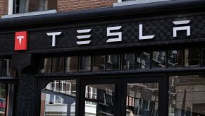 A logo of Tesla is seen outside its showroom on March 14, 2020 in Amsterdam, Netherlands