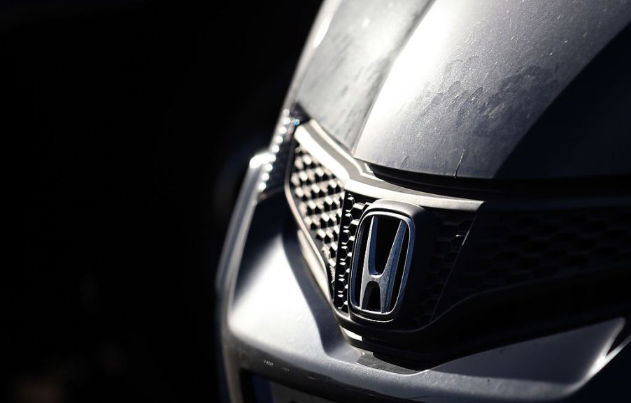 A Honda logo seen on the front of an SUV