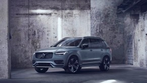 A gray Volvo XC90 midsize SUV is parked.