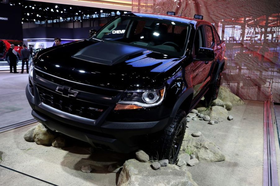 A black Chevrolet Colorado ZR2 on display at an auto show