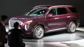 An attendee photographs the 2020 Hyundai Palisade SUV after it was unveiled at AutoMobility LA