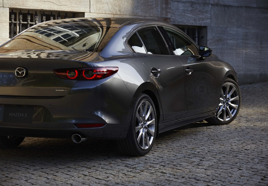 the rear view of a gray Mazda 3