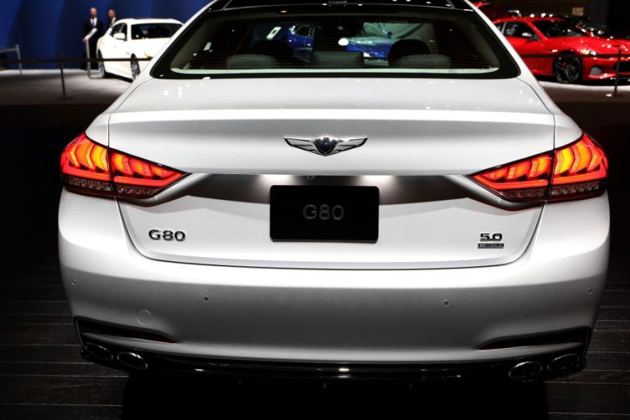 A Genesis G80 luxury car on display at an auto show