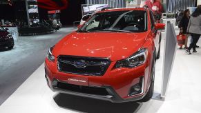 A Subaru Crosstrek on display at an auto show