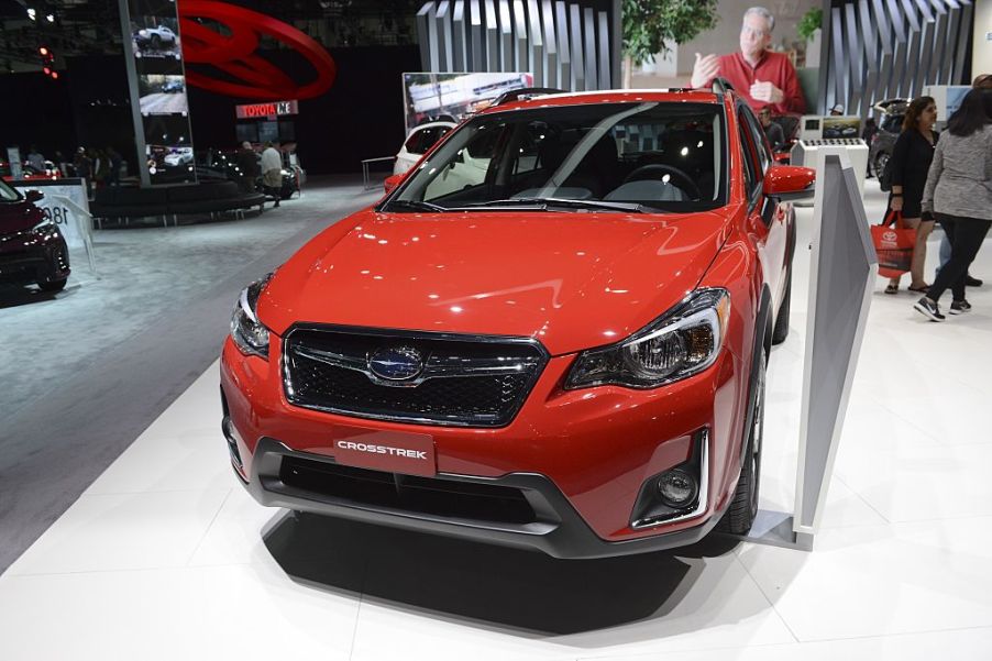 A Subaru Crosstrek on display at an auto show