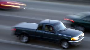 A Ford Ranger truck rushes through "The Orange Crush" freeway intersection in Orange, CA,