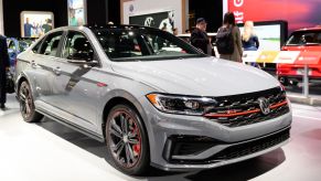 A Volkswagen Jetta GLI on display at an auto show