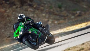 a sparkly green ninja zx-14r raging down the road at high speed