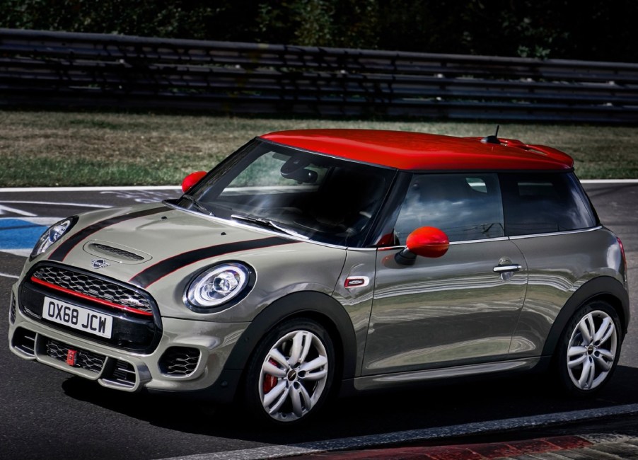 Tan 2019 Mini Cooper JCW hatchback going around a track