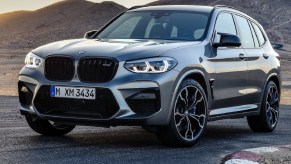 Gray 2020 BMW X3 M Competition crossover parked on a racetrack.