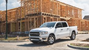 a white Ram work truck on the job