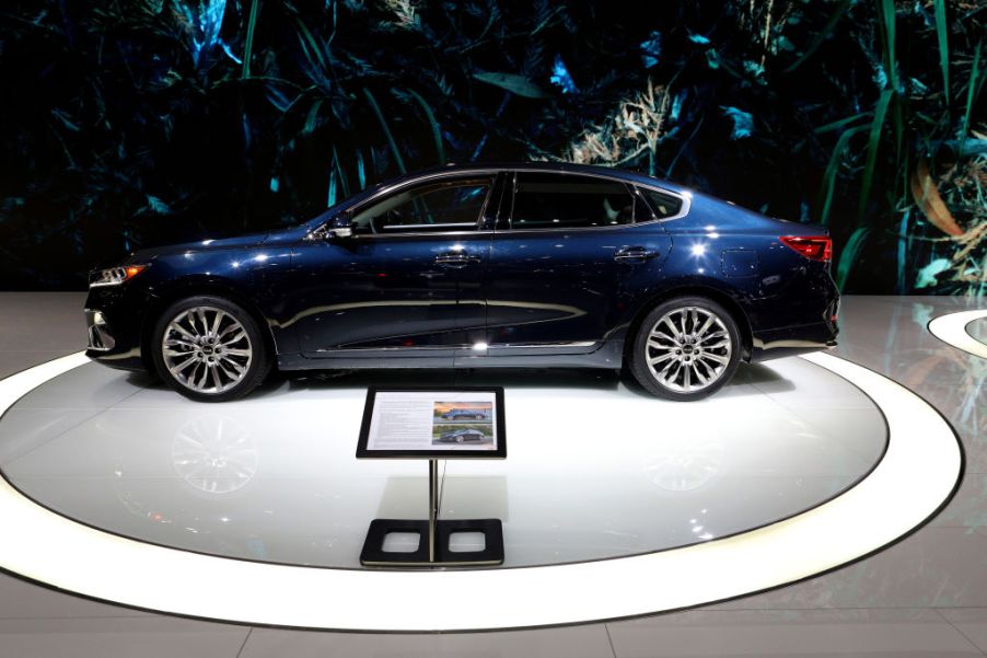 A 2020 Kia Cadenza on display at an auto show