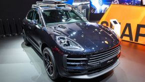 A new 2020 Porsche Macan on display at an auto show