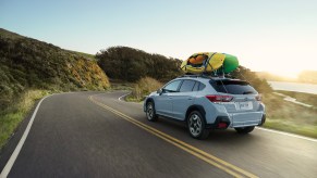 A light blue 2020 Subaru Crosstrek on the track.