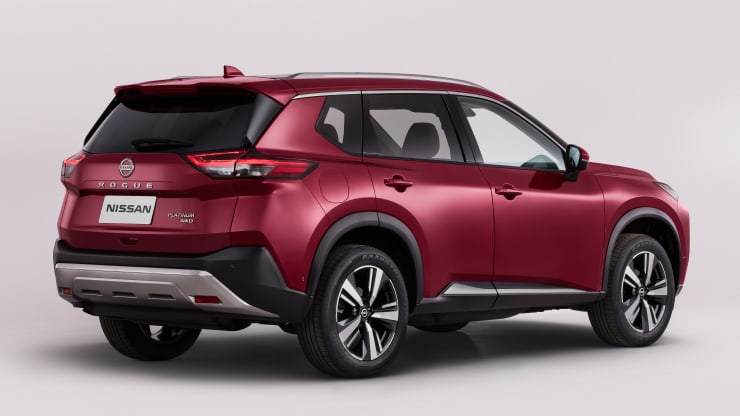 2021 Nissan rogue rear 3/4 shot in red in studio