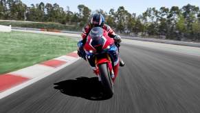 a front view image of a red, white, and blue Honda Fireblade sport bike