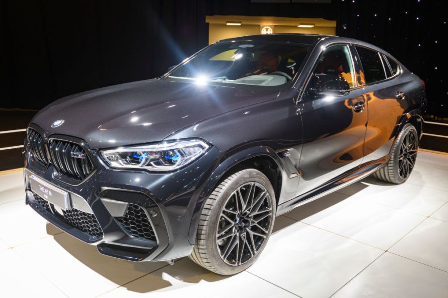 A new BMW X6 on display at an auto show