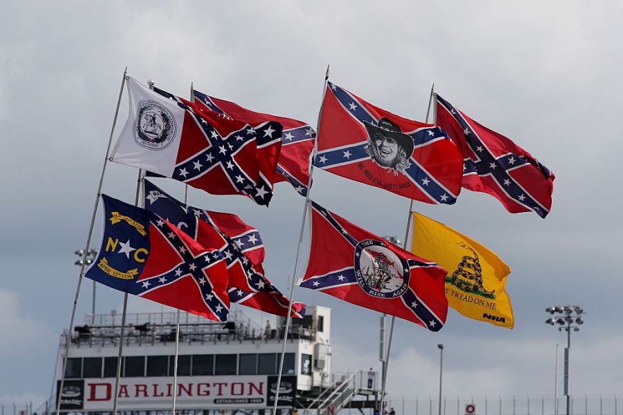 Confederate and American flags waving at NASCAR event at Darlington